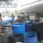 Iglesias colaboran en campaña ahorro agua potable Boca Chica