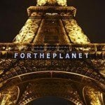«Por el planeta» se lee en Torre Eiffel, tras acuerdo Conferencia Cambio Climático